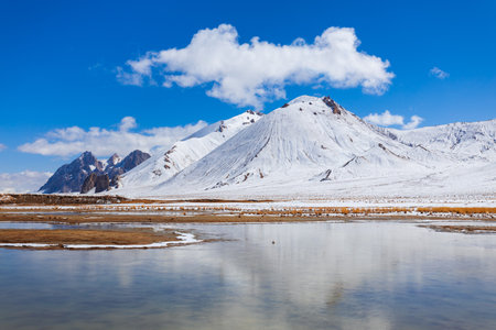 Shorkul lake and Pamir mountains landscape. Shorkul or Shurkul lake is located near the Pamir Highway and Murghab town in Tajikistan.の写真素材
