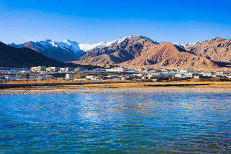 Bartang river, Murghab town and Pamir mountains in Tajikistan. Murghab or Murghob or Murgab is located on the Pamir Highway.の写真素材
