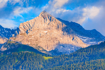 Zugspitze and Alpspitze Alps mountains aerial panoramic view from Eckenhutte viewpoint in Garmisch-partenkirchen town in Bavaria, southern Germanyの写真素材