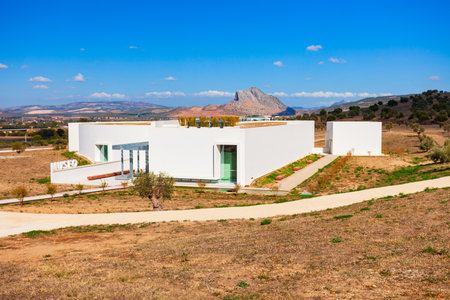 Archaeological Dolmens of Antequera Museum. The Dolmen of Menga is a megalithic burial mound called a tumulus, a long barrow form of dolmen.の写真素材