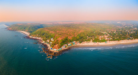 Arambol Beach aerial panoramic view at sunset. Arambol Beach is a public beach located in North Goa in India.の写真素材