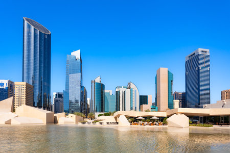 Al Musallah Mosque Prayer Hall and Abu Dhabi skyline. Abu Dhabi is the capital city of the United Arab Emirates.の写真素材