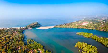 Talpon river, Galgibaga and Talpona beach aerial panoramic view at sunset. Galgibaga or Galgibagh beach is located near the Palolem beach in South Goa in India.の写真素材