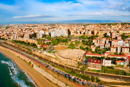 Tarragona Amphitheatre aerial panoramic view. Tarragona Amphitheatre is a Roman amphitheatre in the city of Tarragona in the Catalonia region of Spain.の写真素材