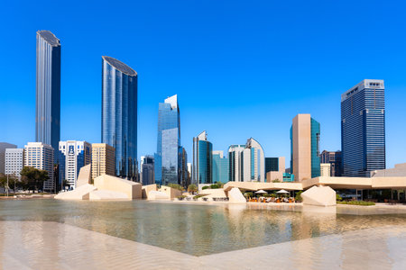 Al Musallah Mosque Prayer Hall and Abu Dhabi skyline. Abu Dhabi is the capital city of the United Arab Emirates.の写真素材