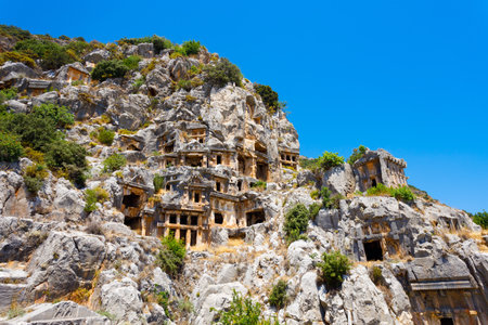 Myra ancient city ruins with rock cut tombs. Myra is located in Demre city in Antalya province of Turkey.の写真素材