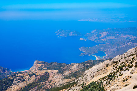 Oludeniz blue lagoon beach aerial panoramic view from Babadag mountain viewpoint in Turkey in Fethiye district of Mugla Province, Turkey.の写真素材