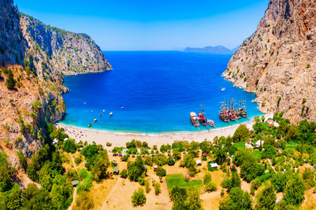 Butterfly Valley Beach or Kelebekler Vadisi aerial panoramic view. Butterfly Beach is a beautiful beach near Oludeniz village, district of Fethiye in Turkey.の写真素材