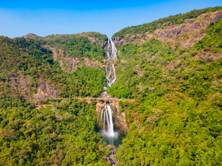 Dudhsagar Falls aerial panoramic view. Dudhsagar waterfall is a waterfall on the Mandovi River in Goa state of India.の写真素材