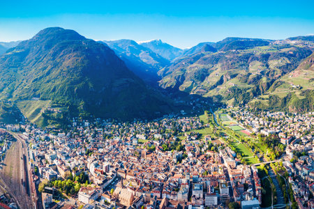 Bolzano and Dolomite mountains aerial panoramic view. Bolzano is the capital city of the South Tyrol province in northern Italy.の写真素材
