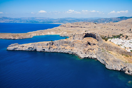Saint Paul's Beach and Lindos Acropolis aerial panoramic view in Rhodes island in Greeceの写真素材