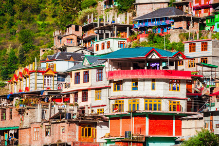 Colorful local houses in Manikaran village in Parvati valley, Himachal Pradesh state in Indiaの写真素材