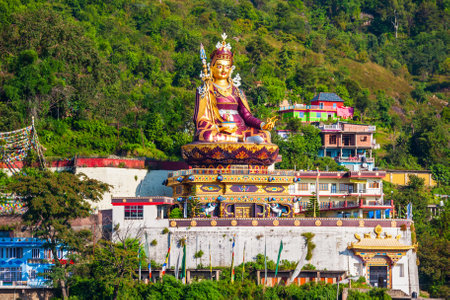 Guru Padmasambhava or Guru Rinpoche statue near the Mahatma Buddha temple in Rewalsar town,  Himachal Pradesh state in Indiaの写真素材