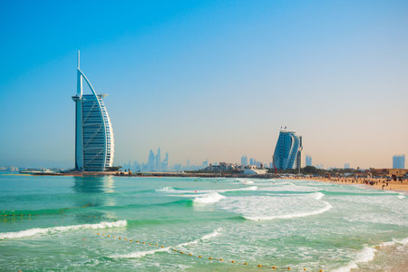 Burj Al Arab luxury hotel and Jumeirah public beach in Dubai city in UAEの写真素材