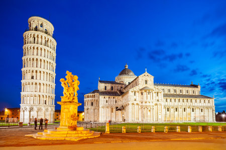 Pisa Leaning Tower and Pisa Cathedral at Piazza dei Miracoli or Square of Miracles in Pisa, Italyの写真素材