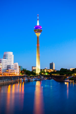 Rheinturm and Media Harbour district in Dusseldorf city in Germanyの写真素材