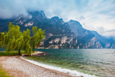 Tip of the Lake Garda, view fron the Riva del Garda town in the Trentino Alto Adige region in Italy.の写真素材