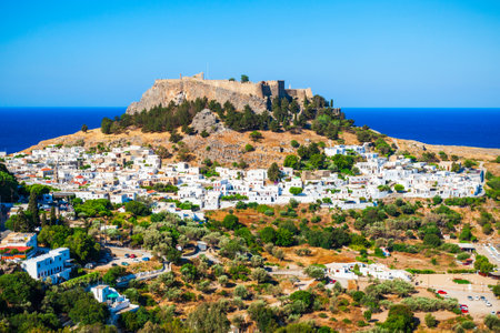 Lindos Acropolis and beach aerial panoramic view in Rhodes island, Greeceの写真素材