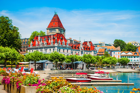 Geneva lake promenade near the Chateau Ouchy Castle, an old medieval castle in Lausanne city in Switzerlandの写真素材