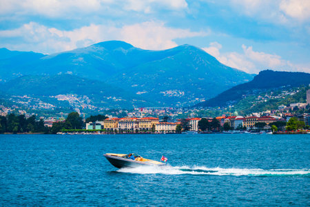 Lugano lake and Lugano city panoramic view in canton of Ticino in Switzerlandの写真素材