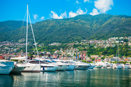 Locarno port with yachts and boats. Locarno is a town located on Lake Maggiore in Ticino canton of Switzerland.の写真素材