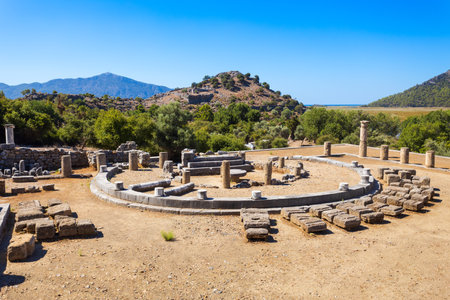 The temple terrace and the round structure ruins at the Kaunos ancient city. Kaunos is located near Dalyan town in Mugla Province, Turkey.の写真素材