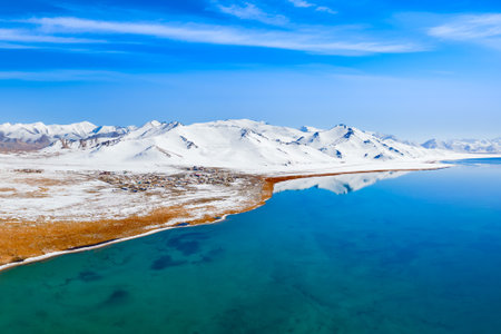 Karakul lake aerial panoramic view. Karakul or Qarokul lake is located in the Pamir Mountains near...