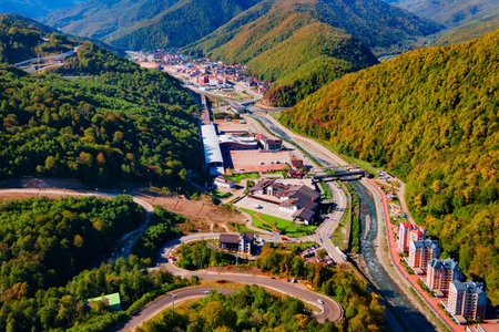 Rosa Khutor village aerial panoramic view. Rosa Khutor is an alpine ski resort located near Krasnaya Polyana town in Sochi region, Russiaの写真素材