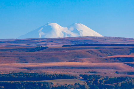 Elbrus view from Kislovodsk National Park. Mount Elbrus is the highest and most prominent mountain peak in Russia and Europe.の写真素材