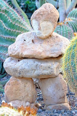 sculpture of stones at the Israeli garden with cactusesの写真素材