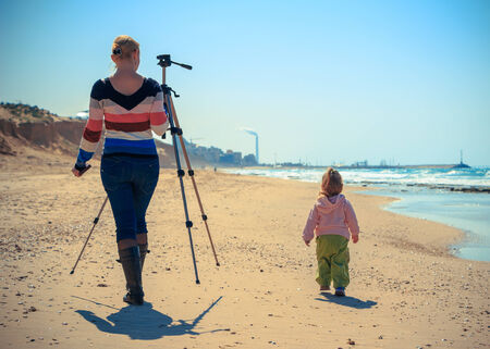 family on the sea help with the shootings and tripodの写真素材