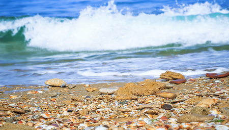 Composition with sea stones on a background of wavesの写真素材