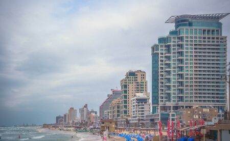 Tel Aviv. Israel. Embankment. Hotels. Beach. Camera: Canon EOS 650D. Date: 2015-04-10. Focal length: 27 mmのeditorial素材