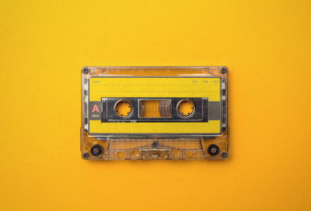 audio cassete on yellow backgroundの写真素材