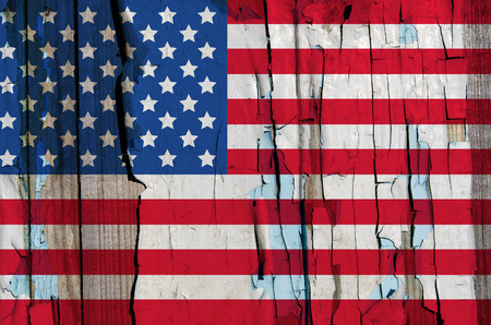 Texture of USA flag on grunge wood with the exfoliated paintの写真素材