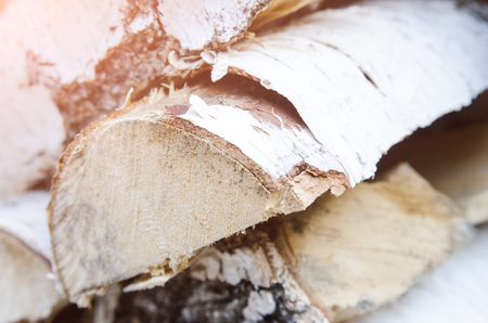 Firewood in woodpile close-upの写真素材