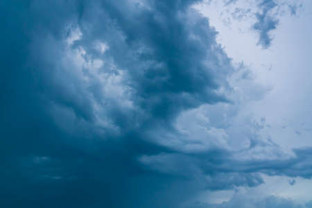 Sunset dark blue thunder clouds and sky