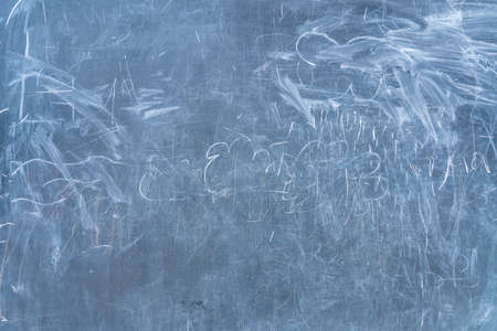 Texture of a scribbled blackboardの写真素材