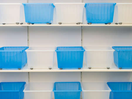 Many empty white and blue containers