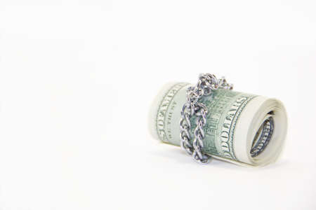 Roll of dollars on white backgroundの写真素材