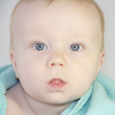 Portrait of cute baby boy after bathing