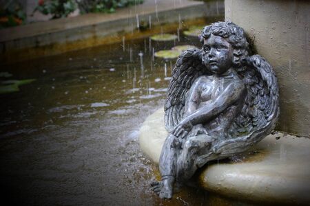 cupid is induced by the belief that the love of men and women to meet.の写真素材