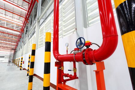 Show water system in warehouse pipes valves and pressure gauge for service when warehouse runの写真素材