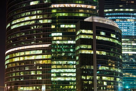 A skyscraper of International Business Centre buildings at nightの写真素材