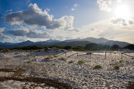 Mountains view from the beach Cinta, Sardinia, Italyの写真素材
