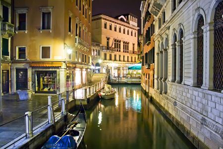 A canal in Venice at night, Italyの写真素材