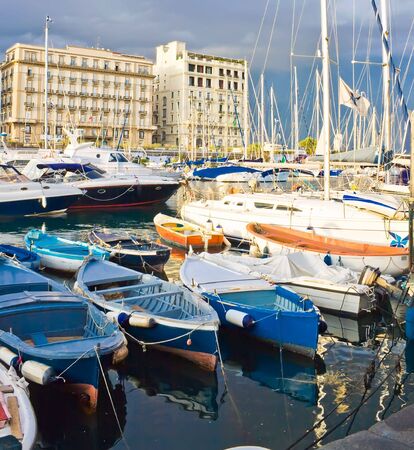 Small boats and yachts in the port of Naples, Italyの写真素材