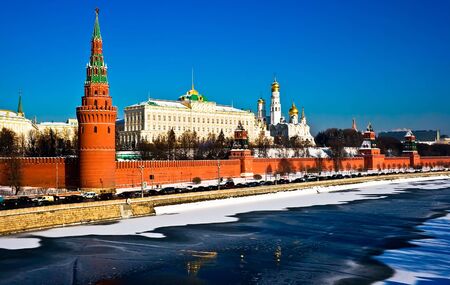 The red brick walls of famous Kremlin in Moscow with its churchesの写真素材