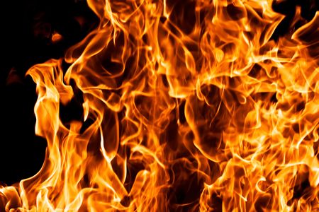Fire burning on black backgroundの写真素材
