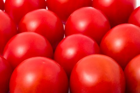 Red tomatos backgroundの写真素材